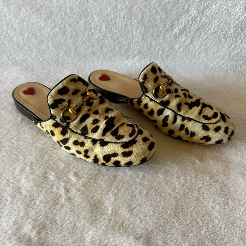 AUTHENTIC - Gucci Leopard Print Mules with Gold Accent